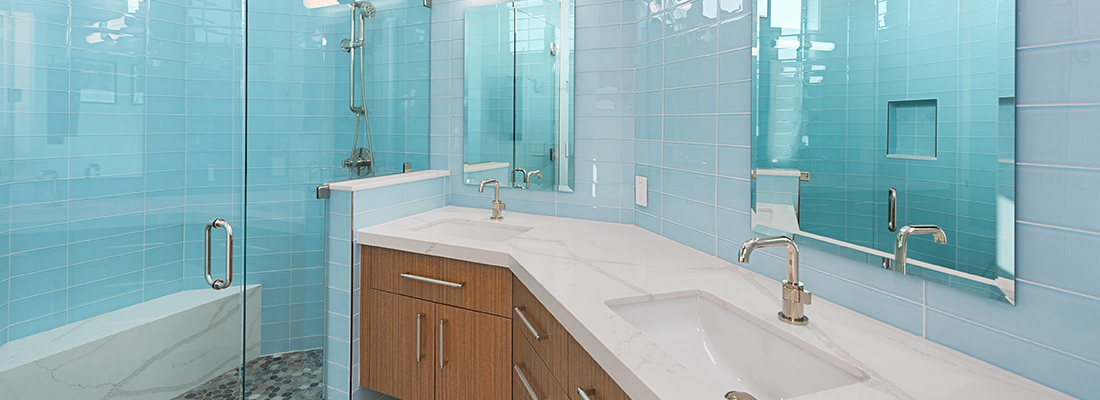 20250117 Wards' Tile Works Testimonials Main Image Light Blue Bathroom 1100x400